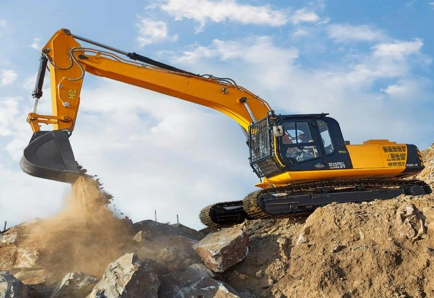 A Comprehensive Guide to Representative Models of JCB Excavators 1 JCB 4CX backhoe loader operating on a construction job site, showcasing its front loader and rear excavator arm capabilities.